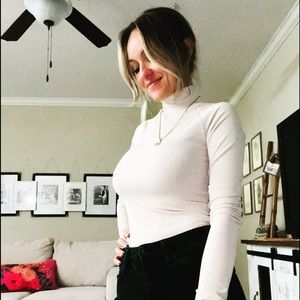 Nude turtleneck bodysuit